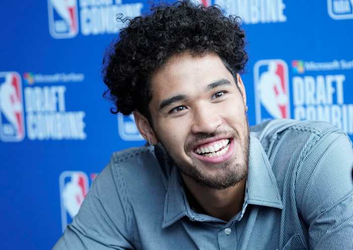 Johnny Juzang talks to the media during the 2022 NBA Draft Combine at Wintrust Arena.
